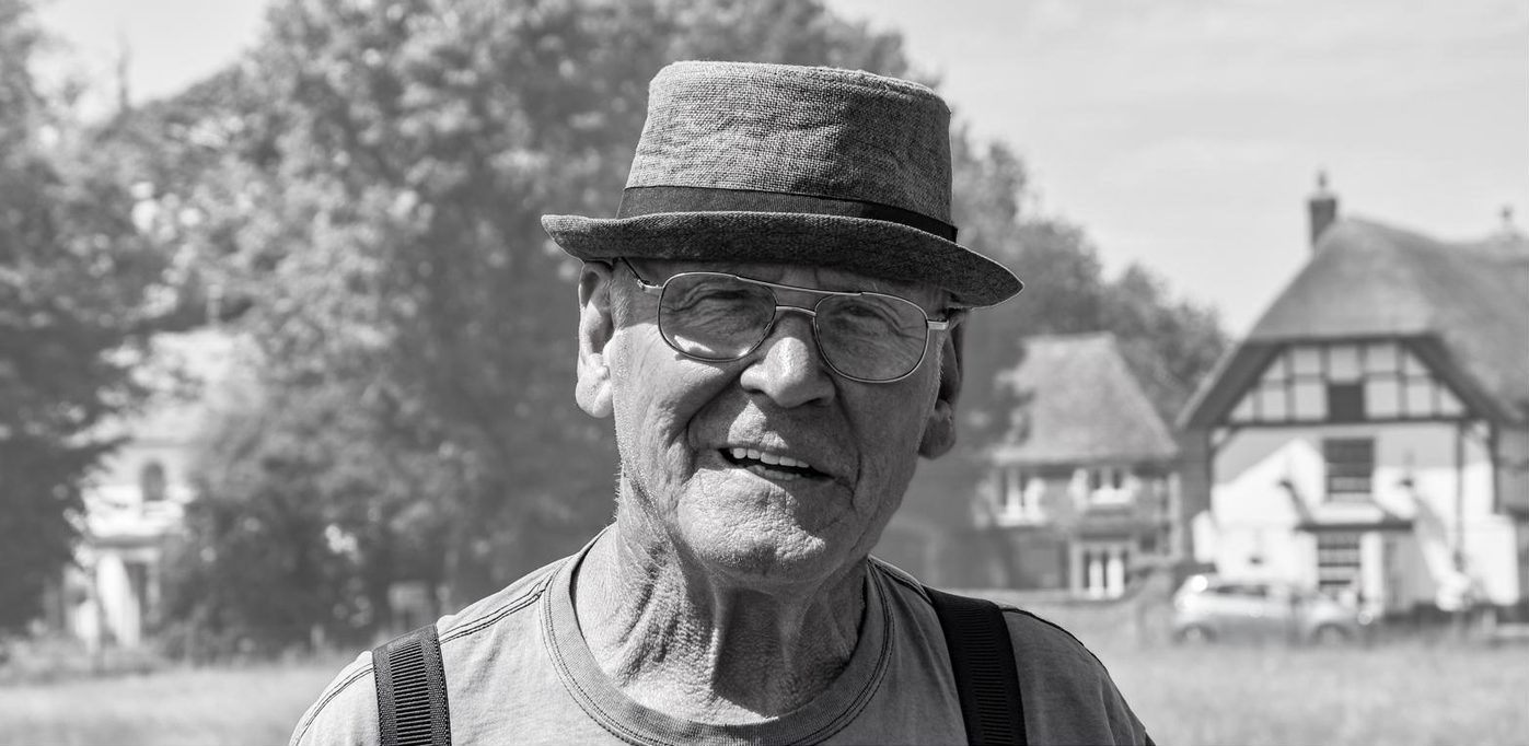 old man with porkpie hat